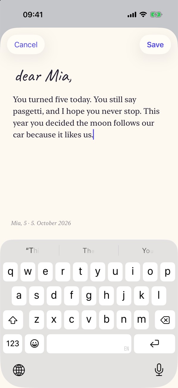 Writing a birthday letter to a child in Cuote, starting “dear Mia,”
